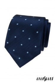 Tmavě modrá kravata se světlými puntíky